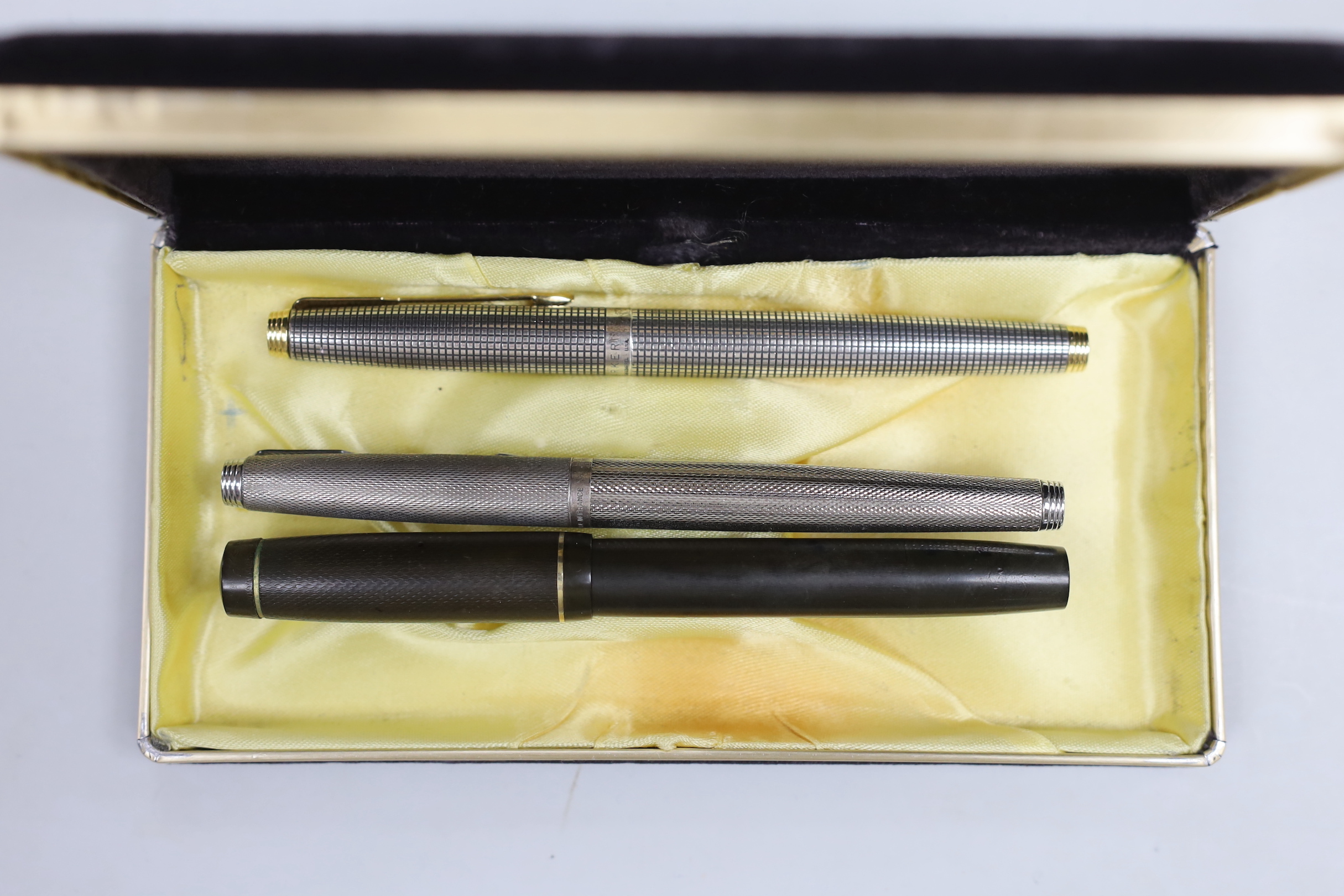 Two Parker fountain pens and Waterman fountain pen